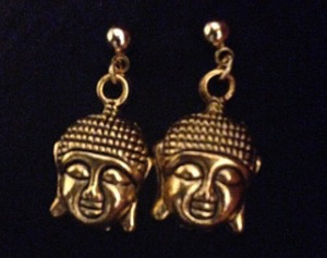 Decapitated heads earrings